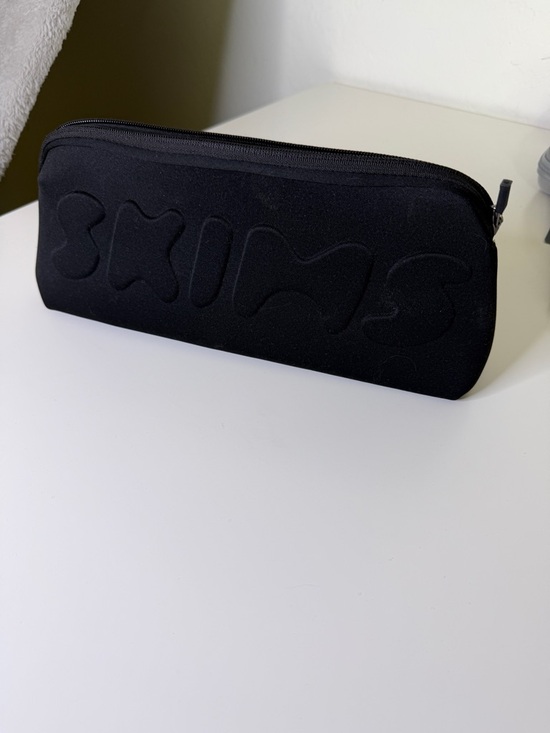 SKIMS Handbags - SKIMS Black Makeup Bag Zip Pouch with Embossed Design